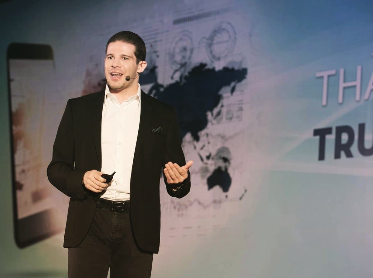 Randy Dobson speaking on stage