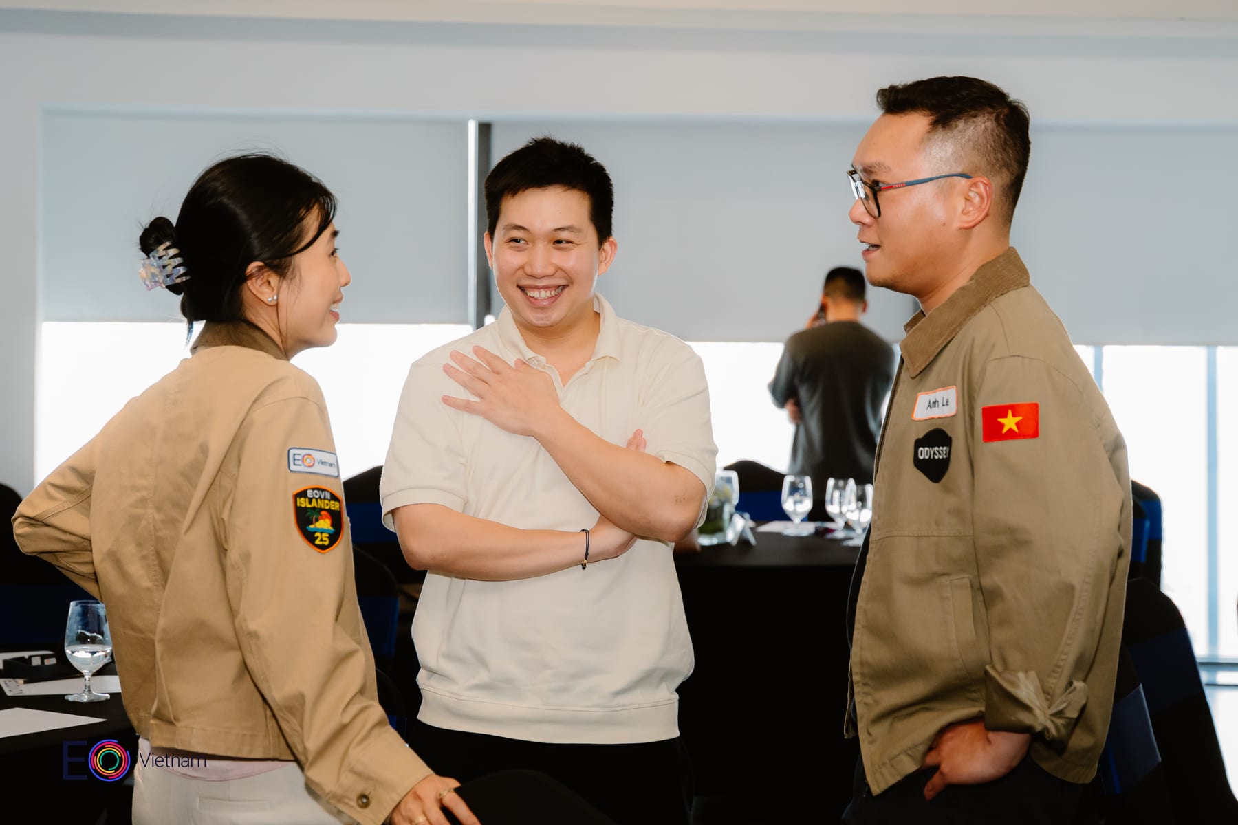 Three EO Vietnam members in conversation at a chapter event
